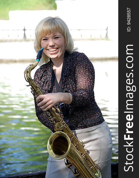 Girl Portrait With Saxophone