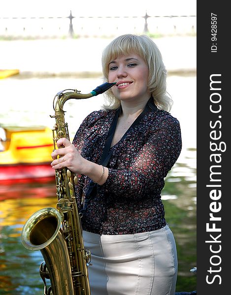 Girl Portrait With Saxophone