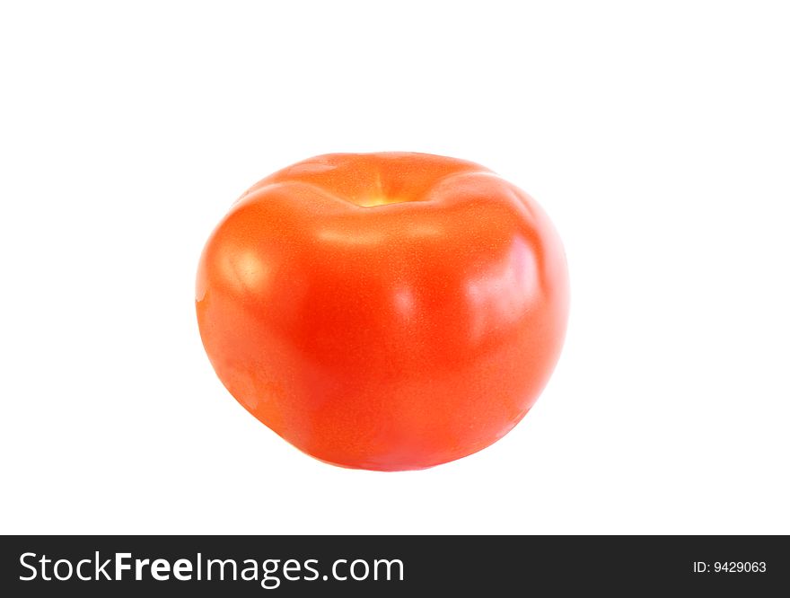 The red tomato on a white background, is isolated.