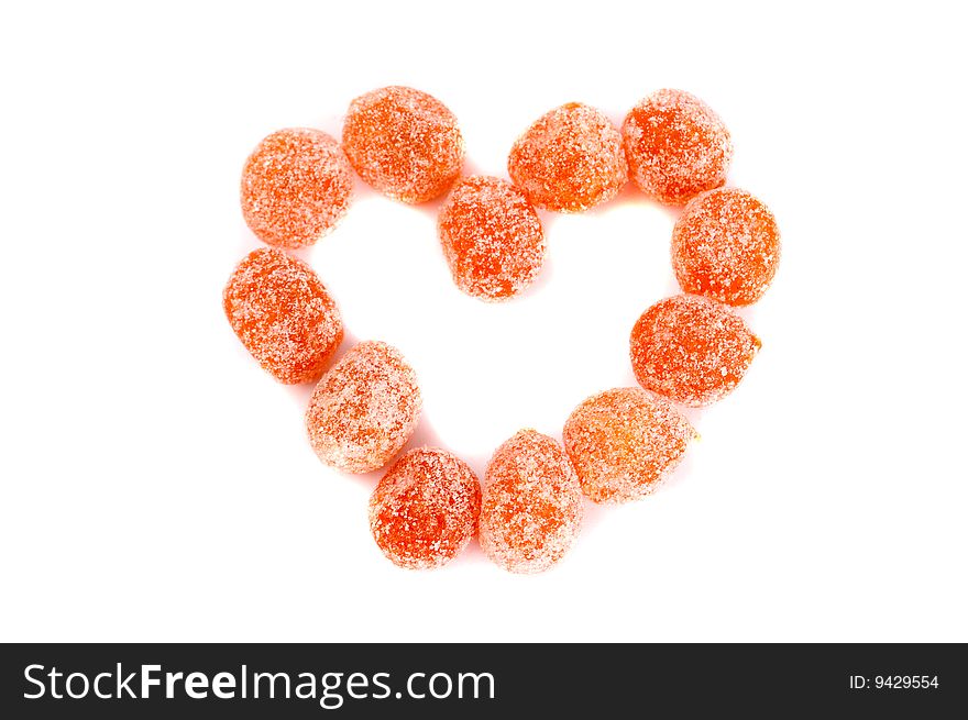 Heart made of orange candies