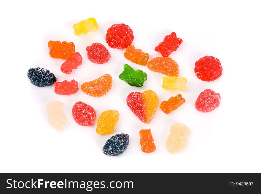 Sweet candies, colorful jelly candies with different fruits taste. Candies shaped in different ways. Sweet candies, colorful jelly candies with different fruits taste. Candies shaped in different ways.