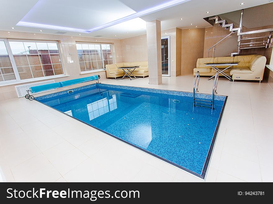 A swimming pool in an elegant luxury home. A swimming pool in an elegant luxury home.