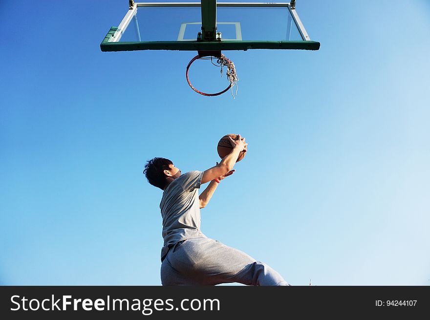 Man Dunking The Ball