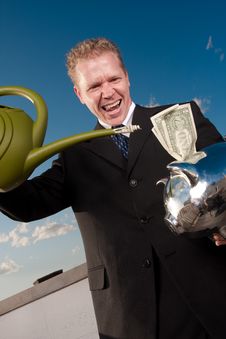 Watering Investment Royalty Free Stock Photo Watering Investment Royalty Free Stock Photo