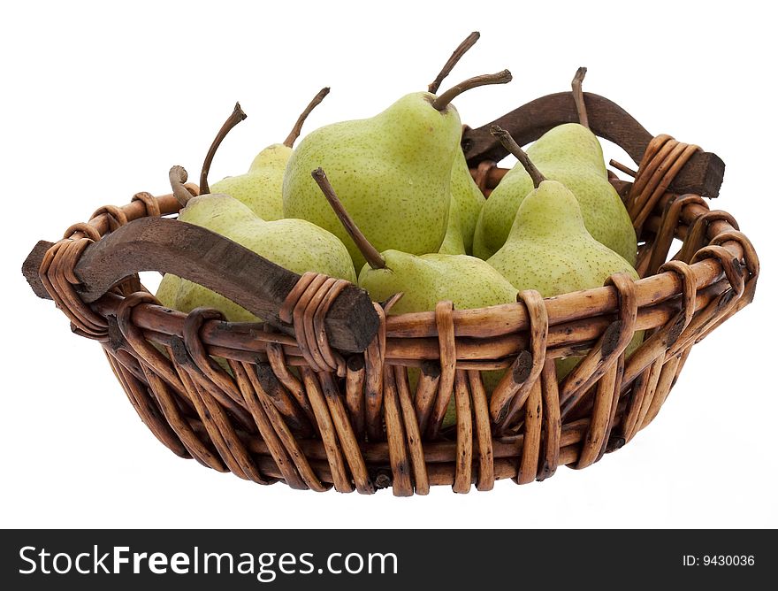 Basket with pears, different pears in a basket against a white background