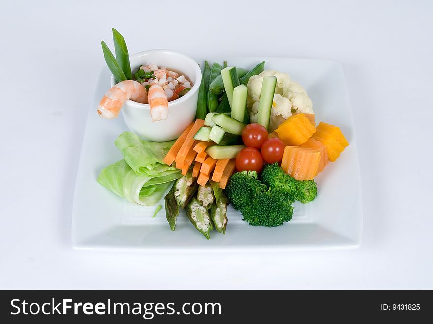 Fresh vegetable sampler plate with ceviche.