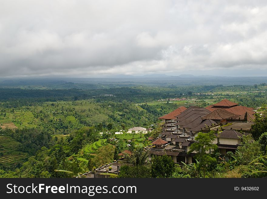 This is a view of the balinese valley and hotel in jungle. indonesia. This is a view of the balinese valley and hotel in jungle. indonesia