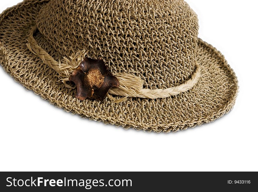 Close up of a straw hat isolated on white