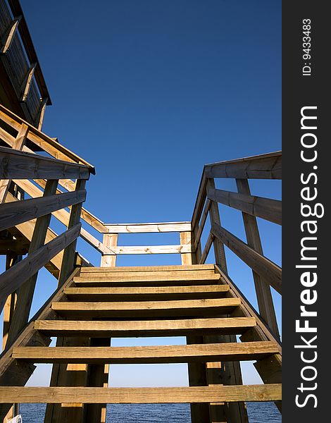 Wooden staircase and blue sky