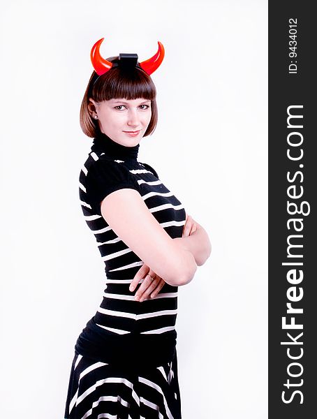 Portrait of a young woman with devilish horns. Portrait of a young woman with devilish horns