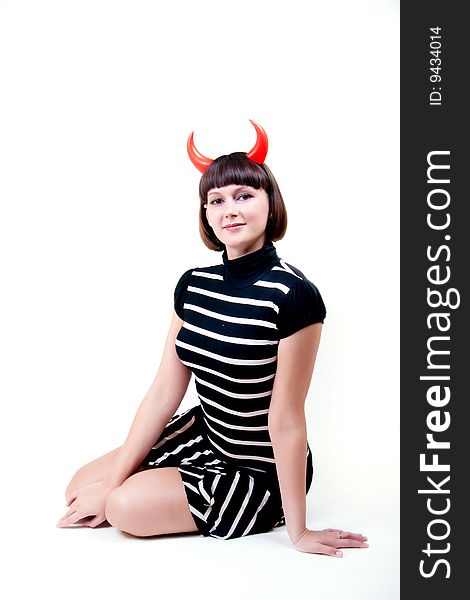 Portrait of a young woman with devilish horns. Portrait of a young woman with devilish horns