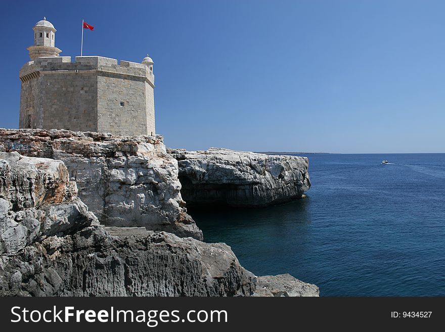 Fortress above a cliff on the Mediterranean coast