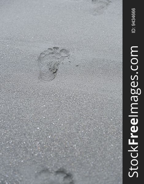 Foot print on the baeach of Japanese sea