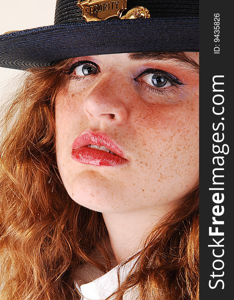 Close-up shoot of a pretty security guard from a shopping mall in the US
in her uniform with her bright red hair. Close-up shoot of a pretty security guard from a shopping mall in the US
in her uniform with her bright red hair.