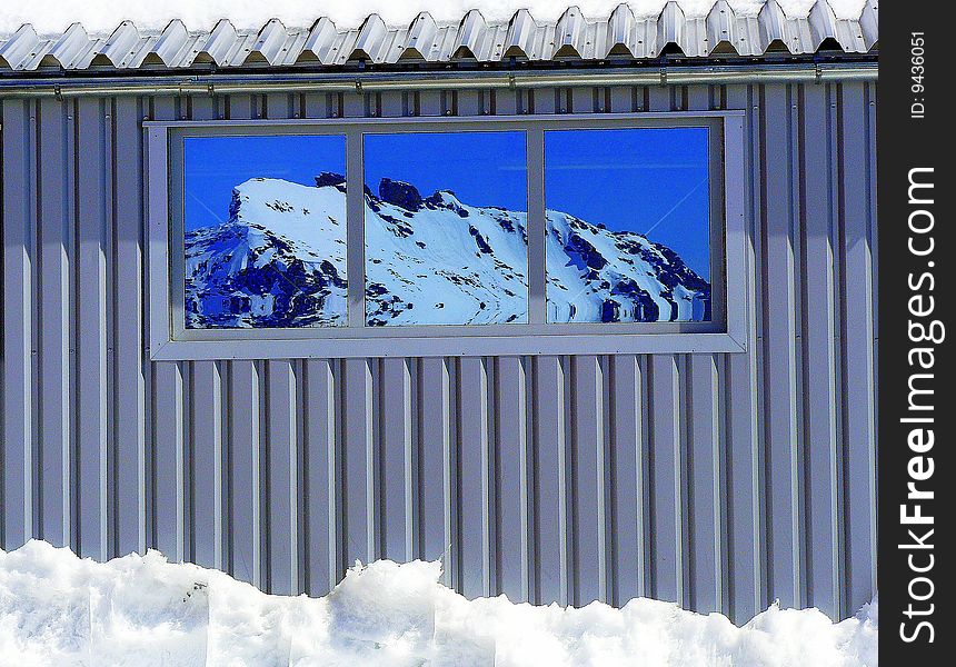 Station of cableway in mirror effect in austrian alpes