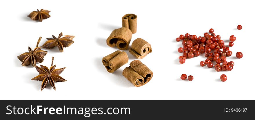 Three different spices with shadows on a white background