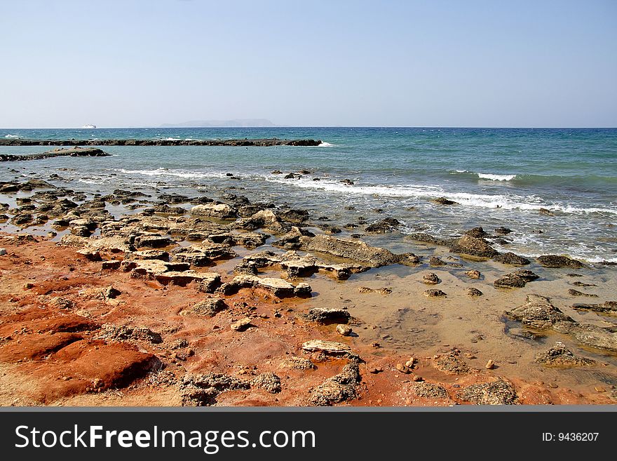 Seascape with red sandstones in Crete, Greece. Seascape with red sandstones in Crete, Greece