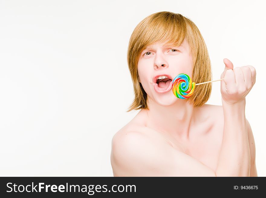 Funny red-haired man with lollipop, isolated on white background
