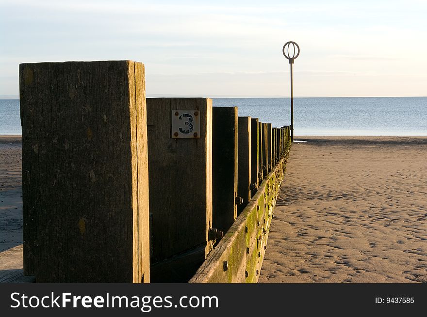 Pillars in a row on a beach. Pillars in a row on a beach