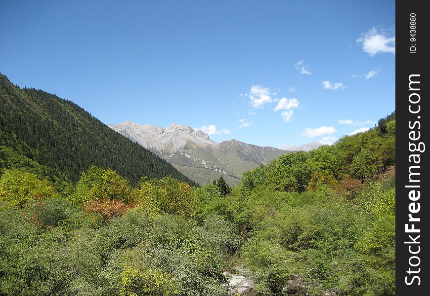 Sky and snow mountains in middle of China