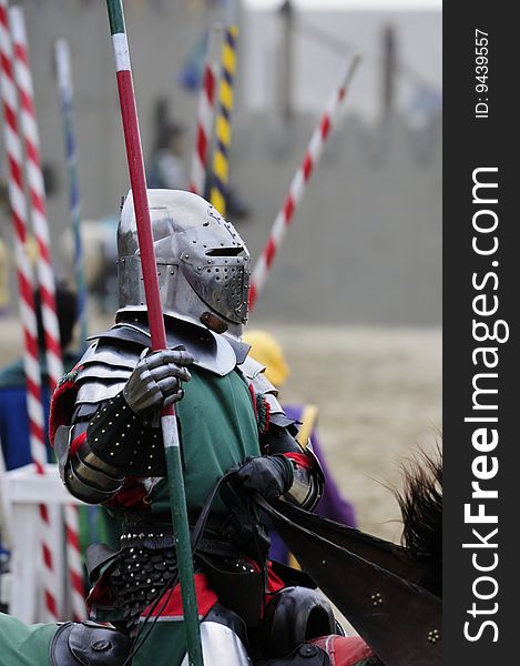 Knights competing in a joust during a renaissance festival. Knights competing in a joust during a renaissance festival.