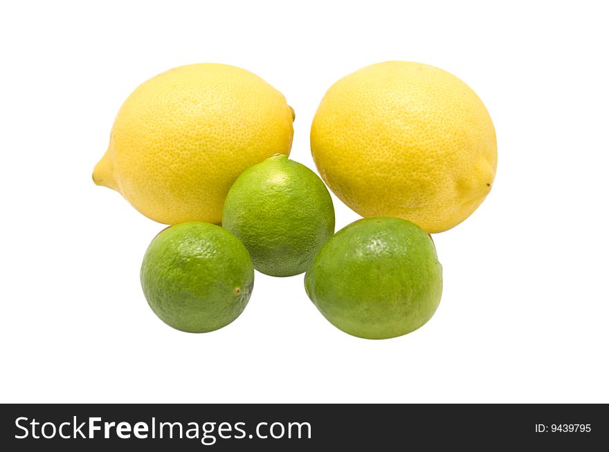 A pair of lemons and three limes, isolated on white. A pair of lemons and three limes, isolated on white.