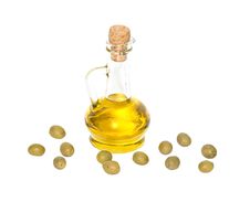 Bottle Of Olive Oil And Olive Fruits Stock Photos