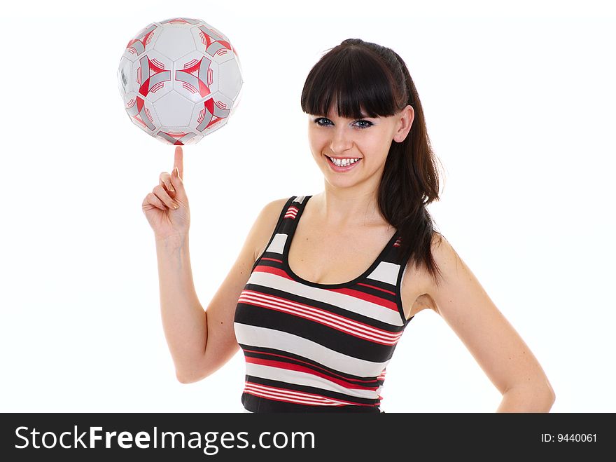 Woman with a football isolated over a white background