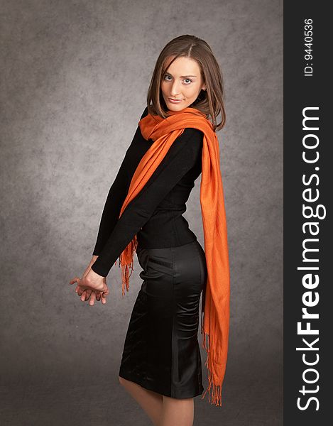 Fashion model with a orange scarf