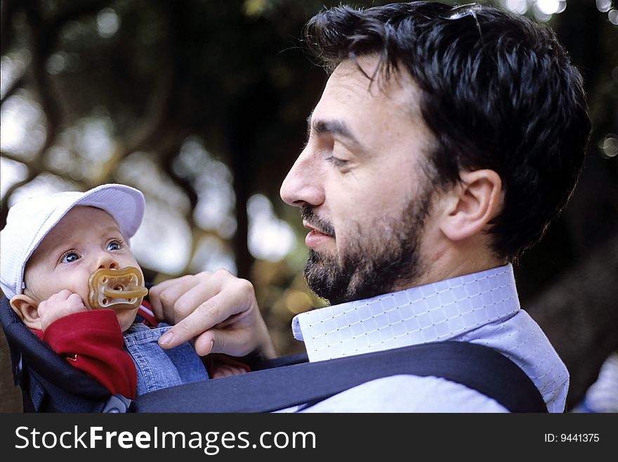 Father and son in a park. Father and son in a park