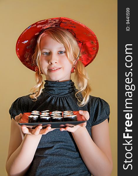 A girl with sushi platter. A girl with sushi platter