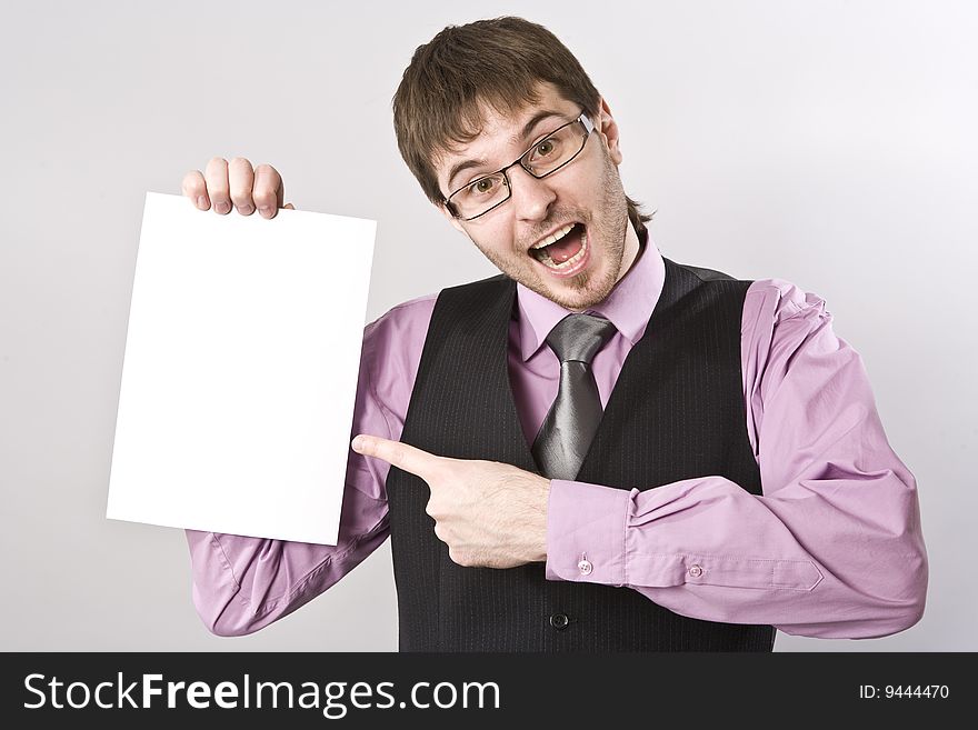 Handsome Businessman Holding A Blank Sign In Front