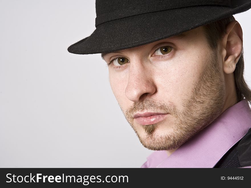 Sure businessman with a bristle on a white background