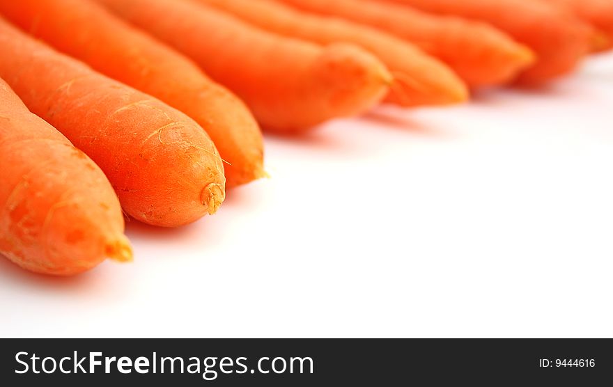Fresh carrots isolated on white