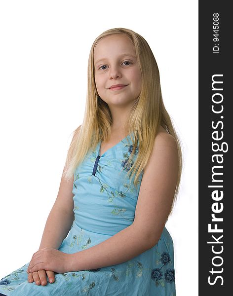 Portrait of girl in a blue dress on a white background. Portrait of girl in a blue dress on a white background