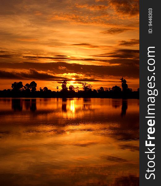 Tranquil sunset over Srah Srang, Angkor Wat, Cambodia. South East Asia. Tranquil sunset over Srah Srang, Angkor Wat, Cambodia. South East Asia.