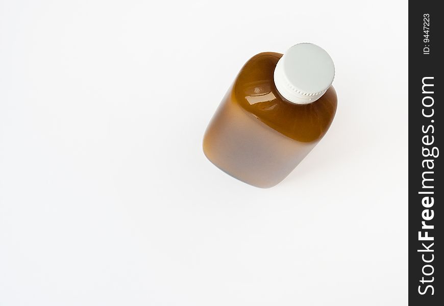 Brown glass mixture bottle isolated on a white background.