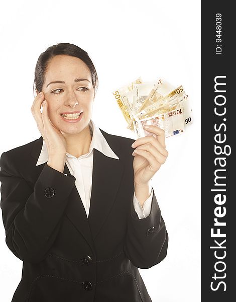 Photo of a depressed young business woman holding currency notes. Photo of a depressed young business woman holding currency notes