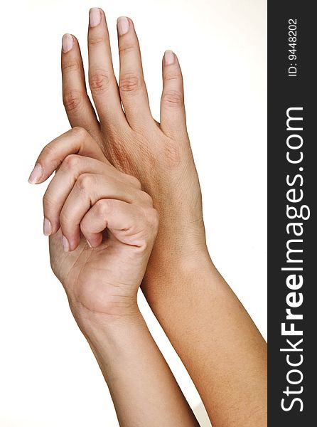 Hands of a young woman, well-kept isolated on a white background.