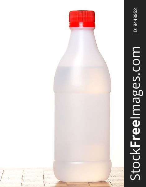 Transparent bottle over white background. Isolated image