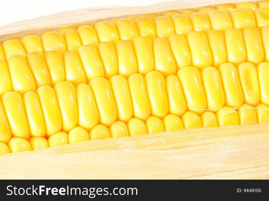Yellow grains of corn on white background . Food image. Yellow grains of corn on white background . Food image