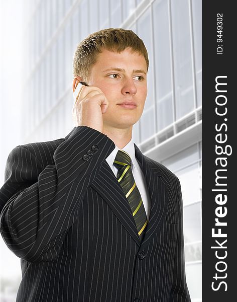 Young business man talking on phone