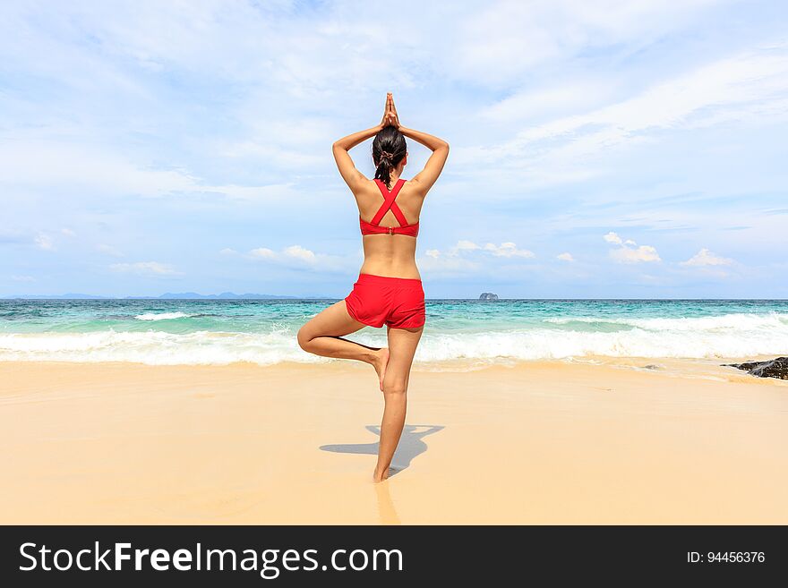 Yoga woman on sea coast, Summer Lifestyle.