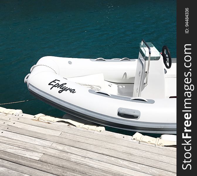 Watercraft Next To A Dock