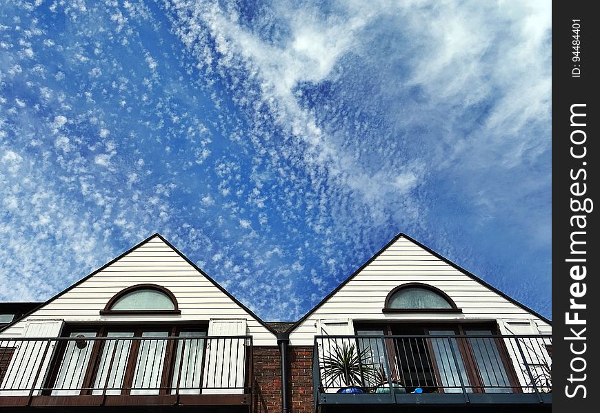 Housetops and sky