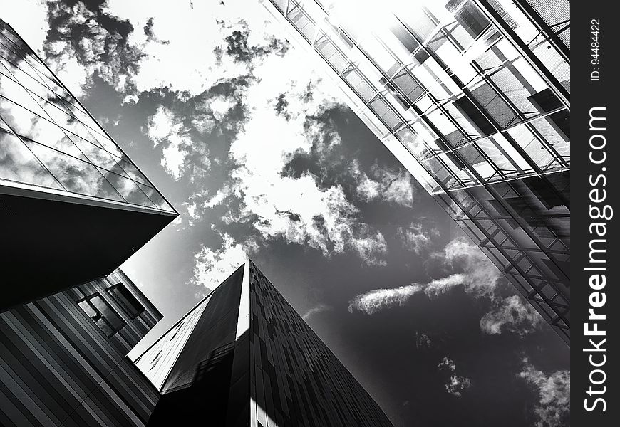 A view of the sky between building tops.