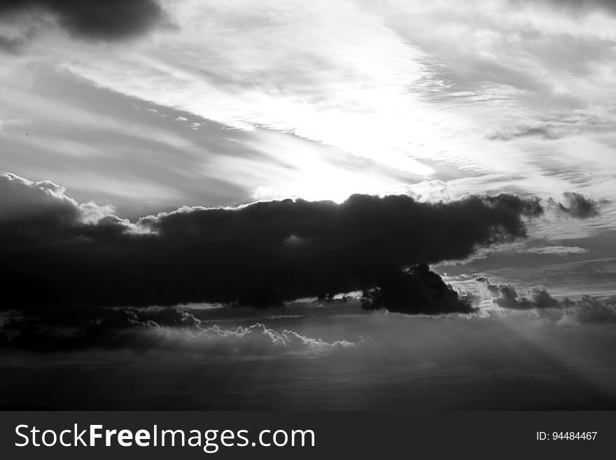 A cloudy sky in black and white photo.