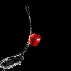 Red Apple And Water Stream Stock Image