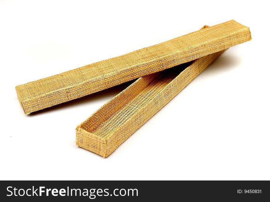 Long wicker box of straw for present