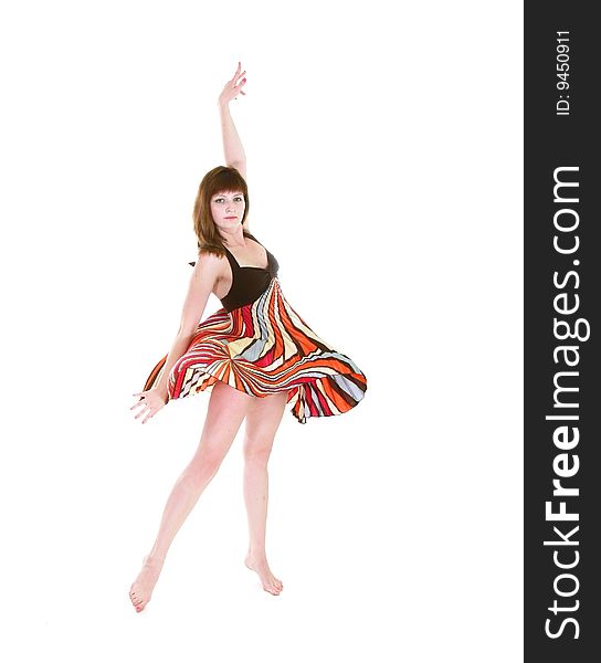 Dancing girl in action over white